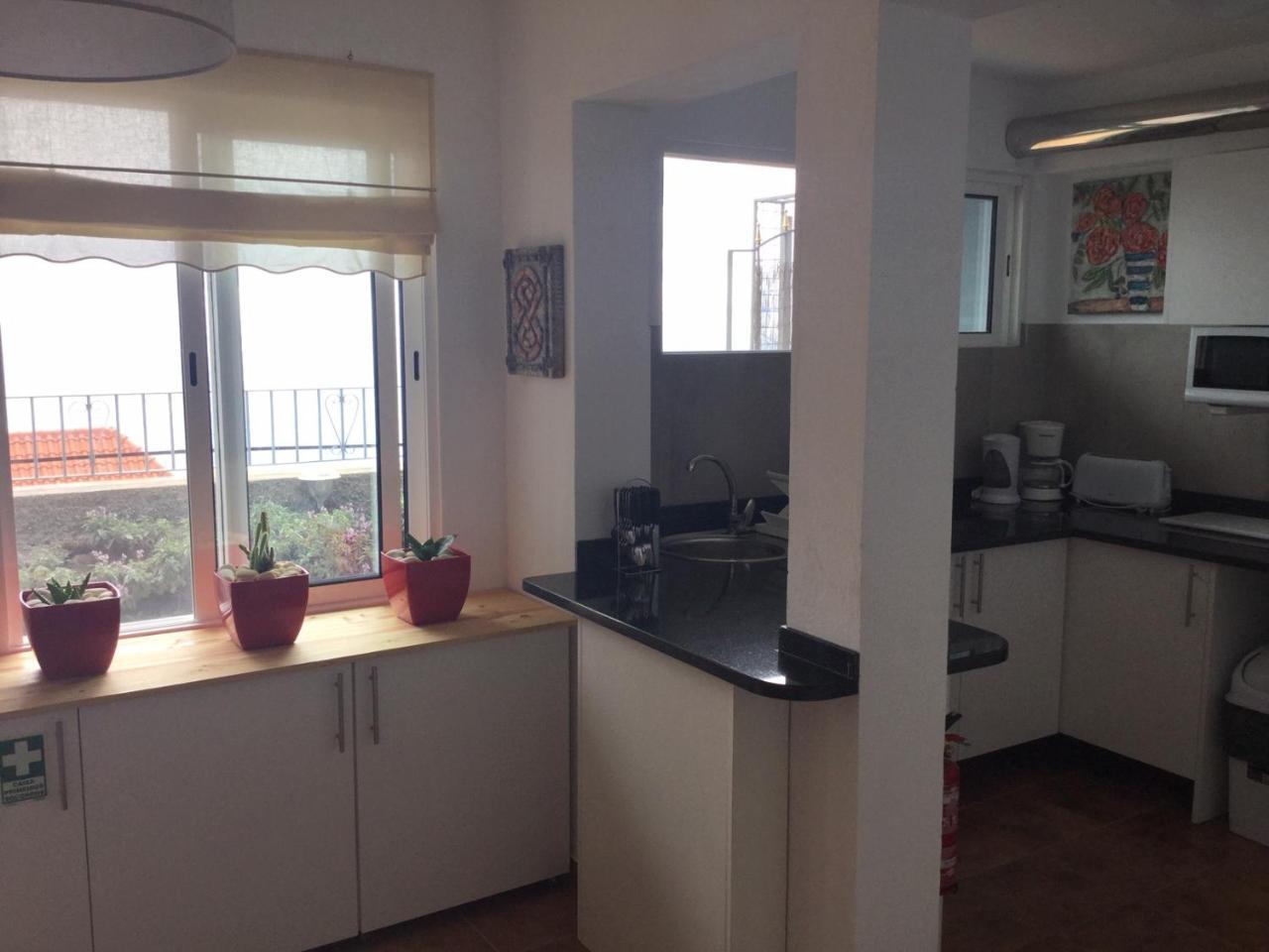 Banda Do Sol Self Catering Cottages Estreito Da Calheta Exterior foto